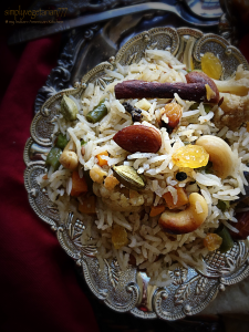 Jodhpuri Pulav is a royal and rich preparation from Jodhpuri cuisine. It is prepared with a selection of nuts and vegetables, cooked in yogurt and other whole spices. It is a complete meal in itself. #vegetablepulav #pilaf #pulao #jodhpuripulao
