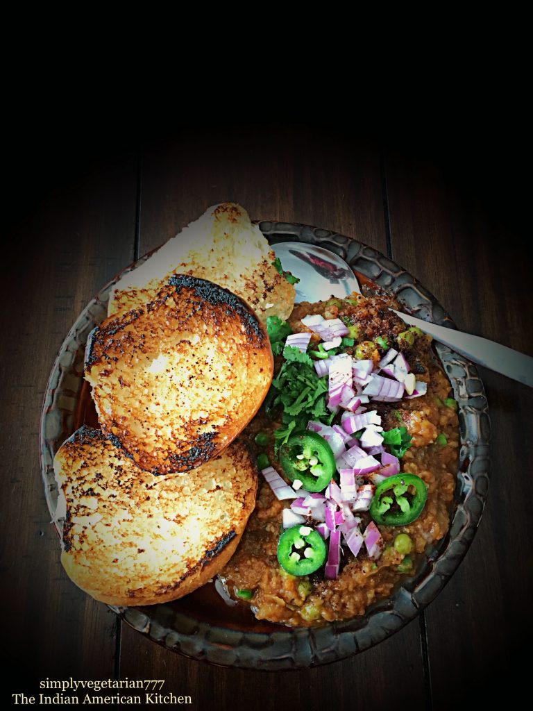 Instant Pot Pav Bhaji Recipe is the lip-smacking delicious street food from Mumbai, India. Potatoes cooked in spicy tomato Curry makes the BHAJI. To counter the heat, bhaji is served with butter grilled Pav or Dinner Rolls. The best part is that this recipe is made in INSTANT POT. The Stove Top instructions are also included. #pavbhaji #instantpotpavbhaji #instantpotvegetarianrecipes #instantpotindianrecipes #instantpotcurry