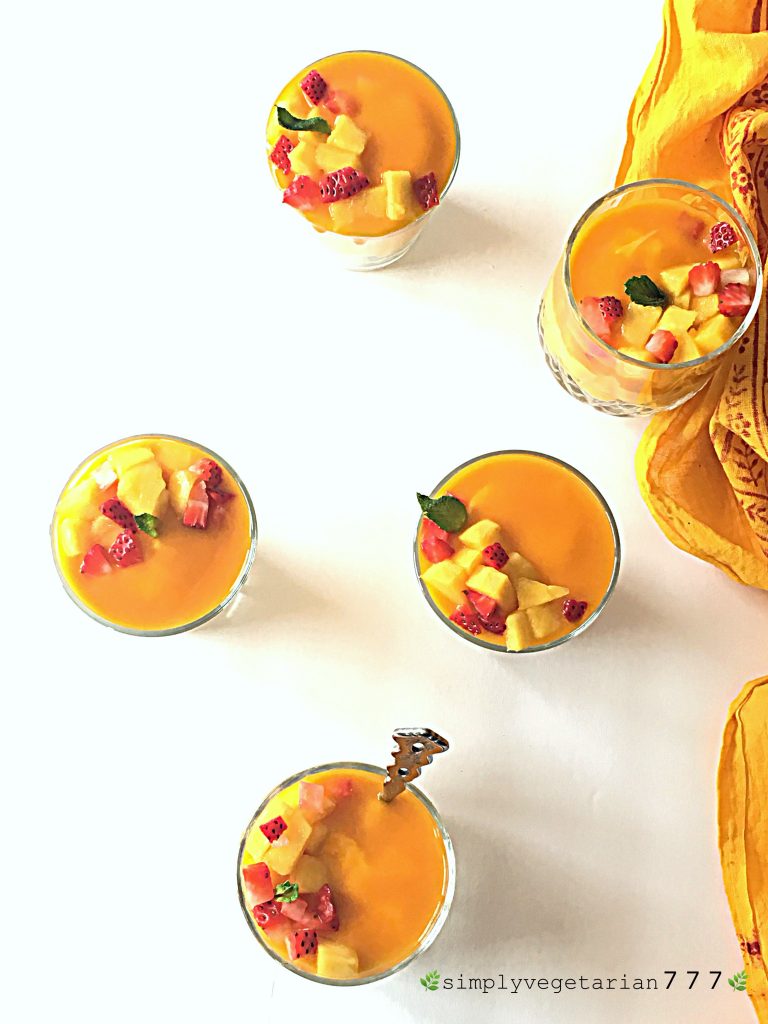 This Mango Cheesecake Trifle is very easy to make and super delicious. Most important part is that it is a No-Cook and No-Bake Recipe. It is a perfect dessert for your parties and get-togethers. #mangorecipes #cheesescake #mangocheesecake #nobakecheesecake #nocookcheesecake #triflerecipes #easydessert #mangodessert #cheesecake #summerdessert #nutfreedessert #easytrifle #partydessert #easycheesecake #nocookdessert 