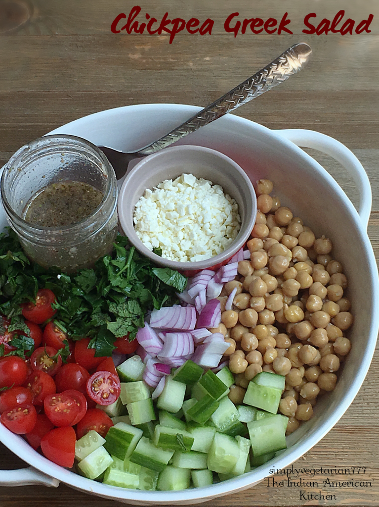 This Chickpeas Greek Salad is a super delicious recipe. It can be eaten as is as a salad or can be stuffed inside a pita or rolled in a wrap to make a mini meal. The salad is so easy to put together. Also, learn how to make Greek Salad Dressing at home with ease. #salad #greeksalad #vegetariansalad #easysalad #chickpeas #lightmeals #saladdressing #greek