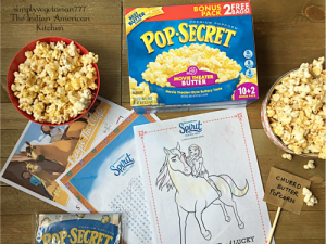 Delicious Churro Butter Popcorn with Pop Secret Spirit Riding Free
