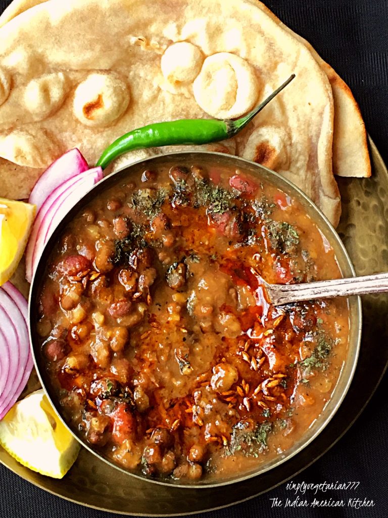 You are going to love this Punjabi Dhaba Daal Instant Pot Recipe. It is finger licking delish and every bite is worth devouring. Creamy and Decadent and what not. It tastes best with Tandoori Roti in my opinion. But goes very well with Rice and Naan too. Stove top instructions + small video included too. #instantpotrecipes #instantpotlentils #instantpotindianrecipes #instantpotdaal #instantpotbeans #dhaabadaal 