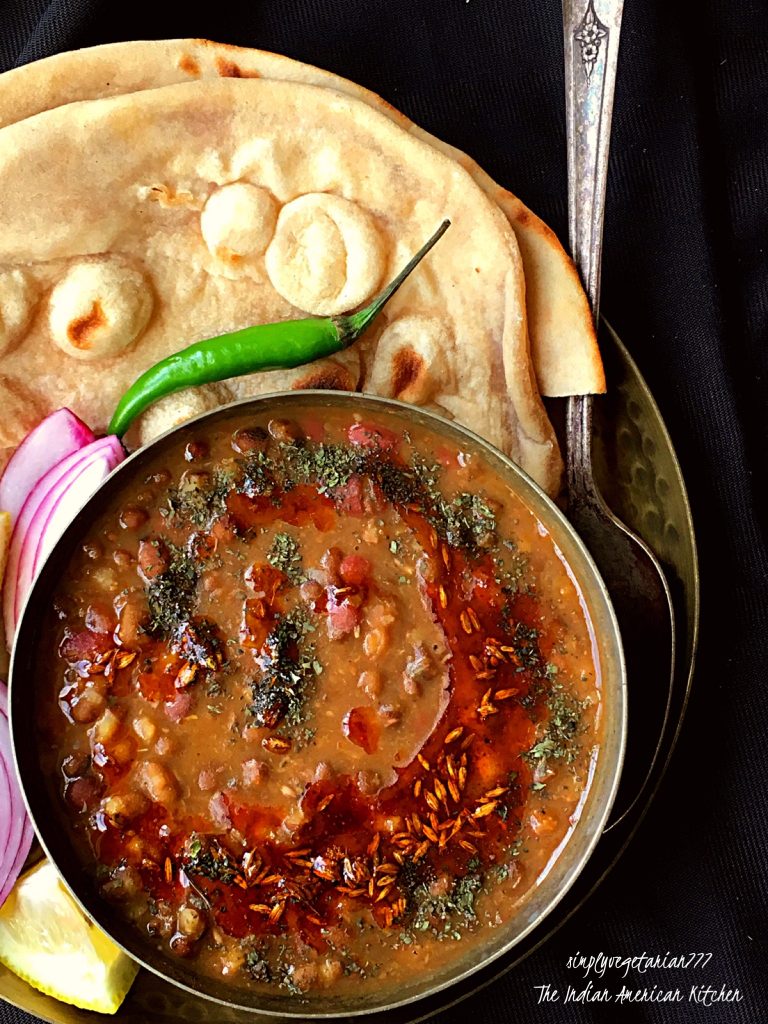 You are going to love this Punjabi Dhaba Daal Instant Pot Recipe. It is finger licking delish and every bite is worth devouring. Creamy and Decadent and what not. It tastes best with Tandoori Roti in my opinion. But goes very well with Rice and Naan too. Stove top instructions + small video included too. #instantpotrecipes #instantpotlentils #instantpotindianrecipes #instantpotdaal #instantpotbeans #dhaabadaal 