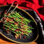 This Green Beans Recipe with Caramelized Onions & Cranberry Chutney is a perfect side dish for Thanksgiving. It is a quick and easy recipe packed with tones of flavors. #greenbeans #thanksgivingrecipe #vegetarianside #Greenbeansonionsrecipe