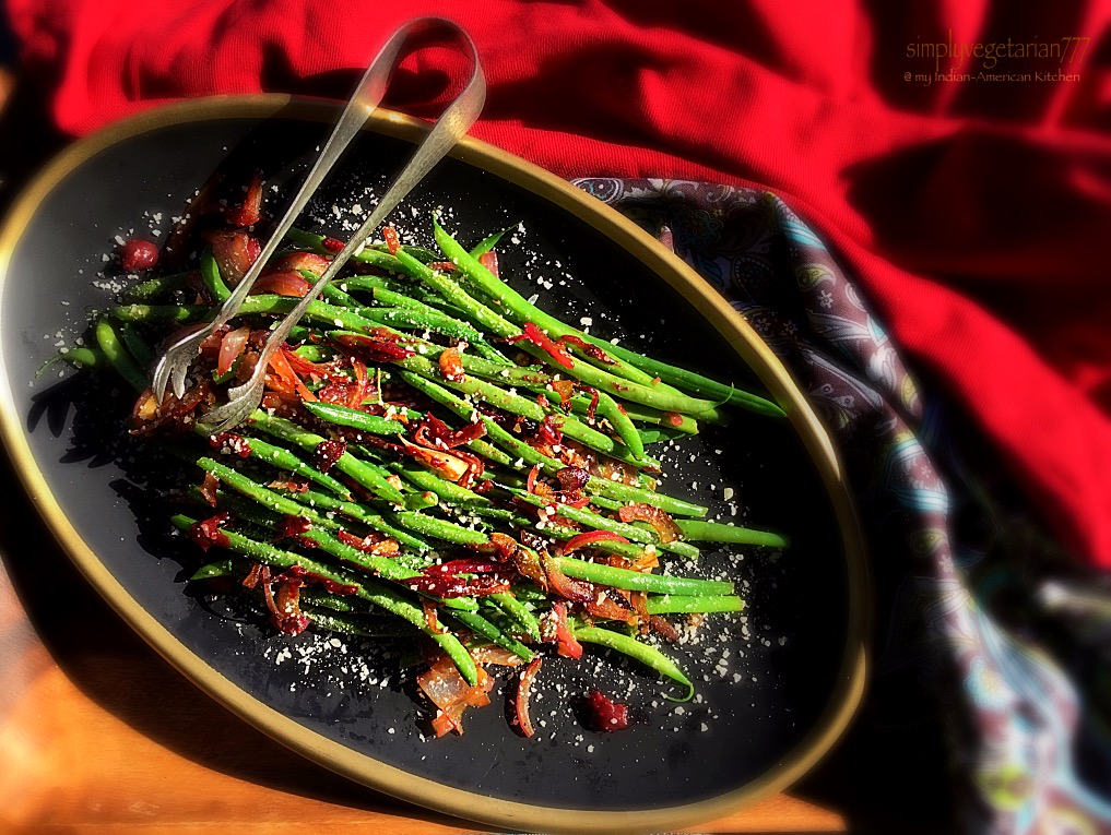 This Green Beans Recipe with Caramelized Onions & Cranberry Chutney is a perfect side dish for Thanksgiving. It is a quick and easy recipe packed with tones of flavors. #greenbeans #thanksgivingrecipe #vegetarianside #Greenbeansonionsrecipe