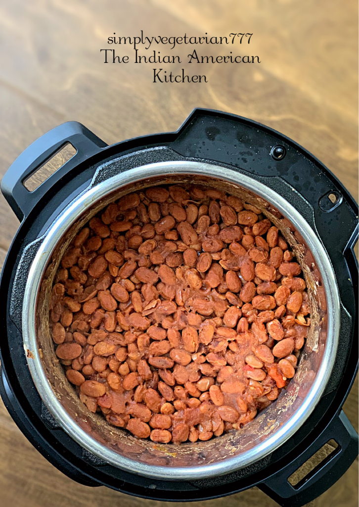 This 3 Ingredients Refried Beans Instant Pot Recipe is a keeper recipe. All the Tex Mex food lovers will love this VEGAN REFRIED BEANS recipe. It is quick, easy and needs no prep at all. Just dump it all in your Instant Pot and you have the best REFRIED BEANS ever. #instantpotrefriedbeans #veganrefriedbeans #mexicanbeans #easybeans #pintobeans