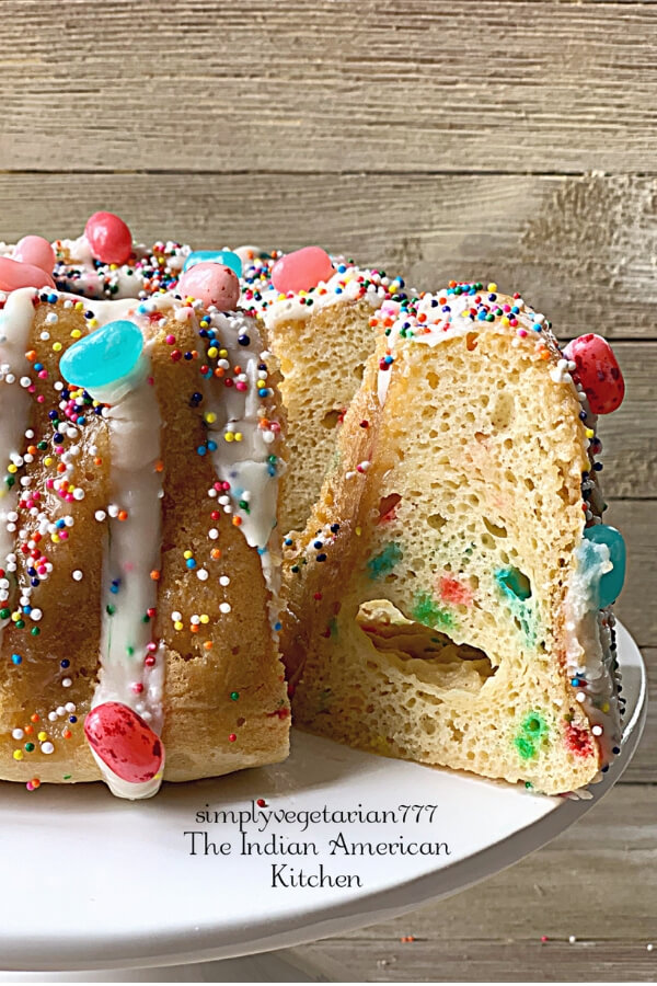 Instant Pot Confetti Cake is super moist & really delicious. It is perfect to make this cake for Easter Brunch or any occasion. It does not taste like pudding at all. #confetticake #funfetticake #eastercake #instantpotcake #easycakerecipe